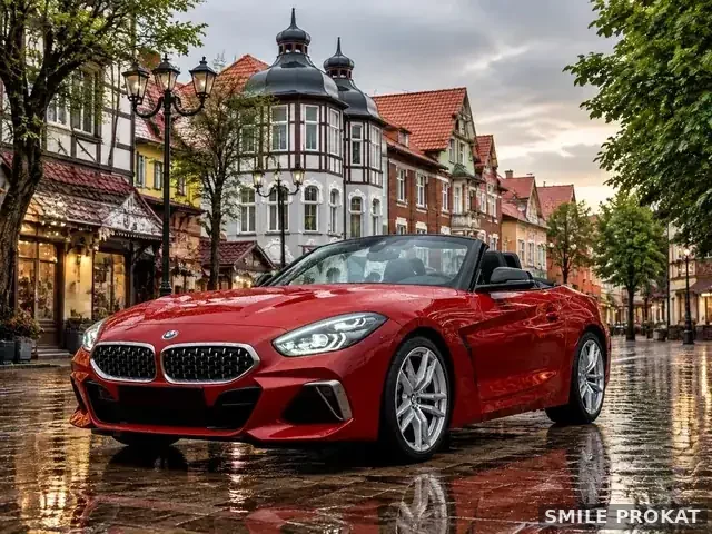 Красный родстер BMW Z4 M40i в аренду, дождливая площадь старого города, отражения
